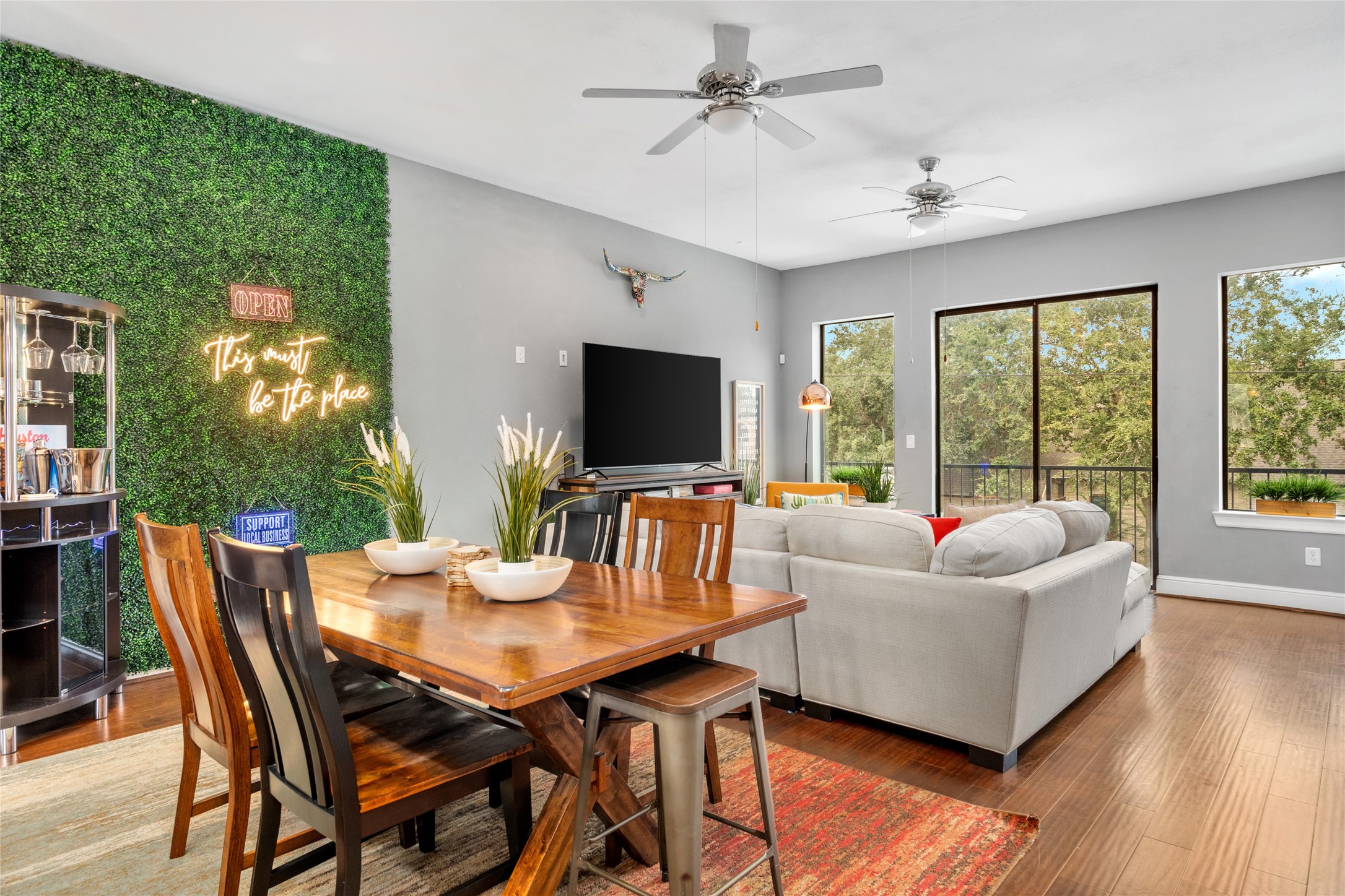 2104 Webster Street Houston, TX 77003 - Photo 12 of 30 a view of a dining room with furniture window and wooden floor