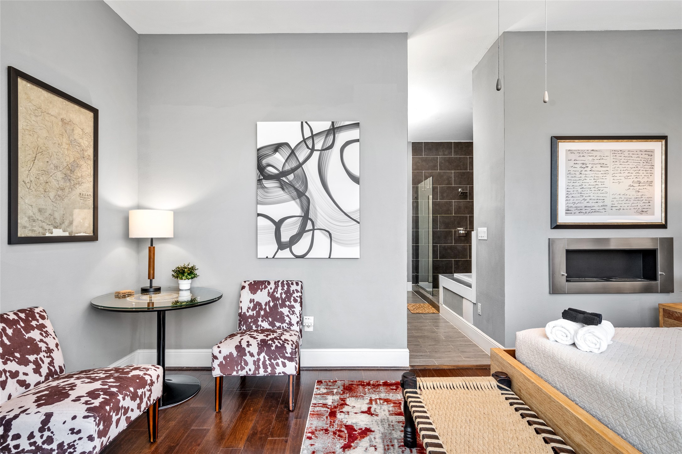 2104 Webster Street Houston, TX 77003 - Photo 15 of 30 a bedroom with furniture and a wooden floor