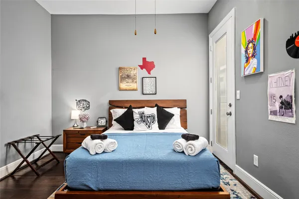 a bedroom with furniture and a bed