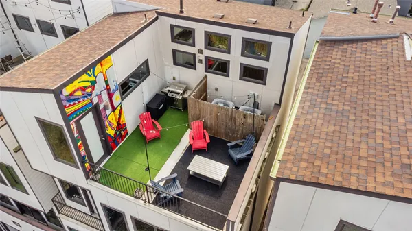 a view of a terrace with furniture