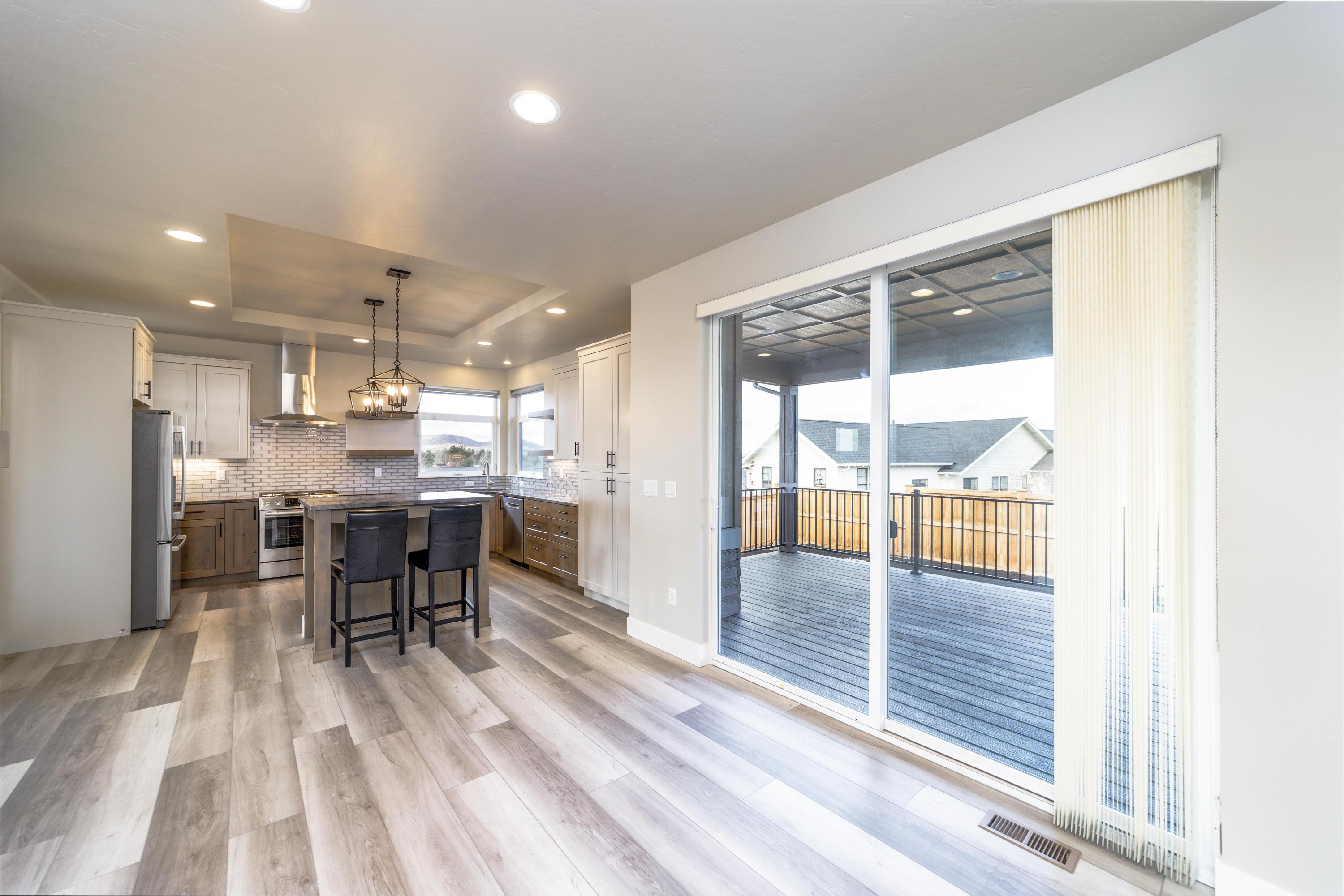 3679 Southwest 45th Street Redmond, OR 97756 - Photo 9 of 41 Dining area with direct access to 2nd covered porch