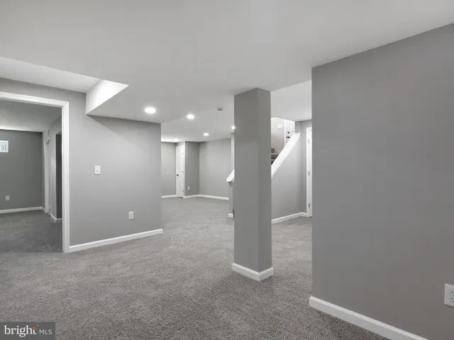 a view of a hallway with entryway