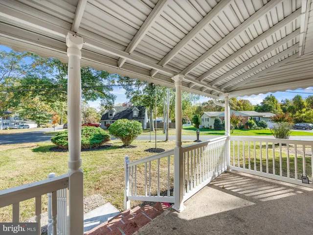 a view of a porch with a big yard