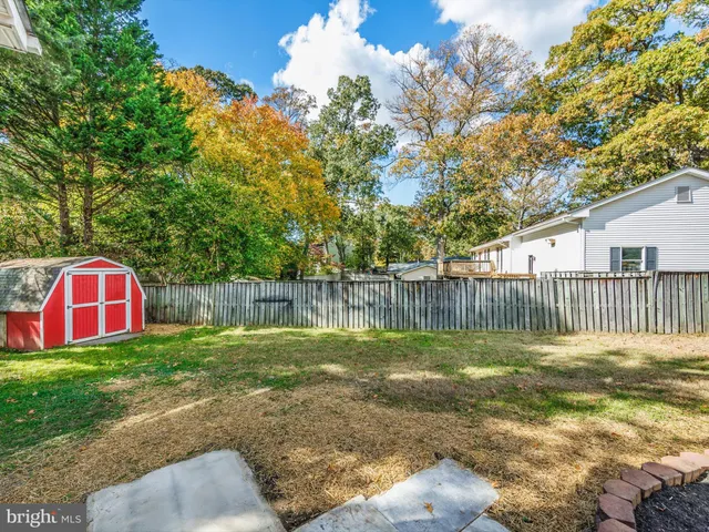 a view of backyard with green space