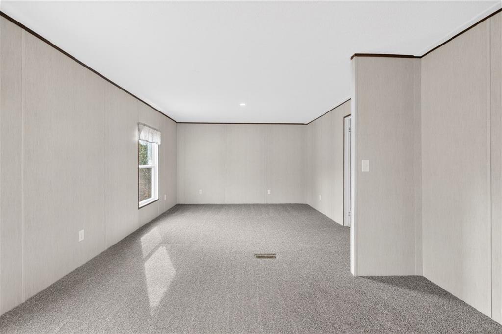 533 Pearwood Road Royston, GA 30662 - Photo 16 of 50 a view of a big room with closet and windows