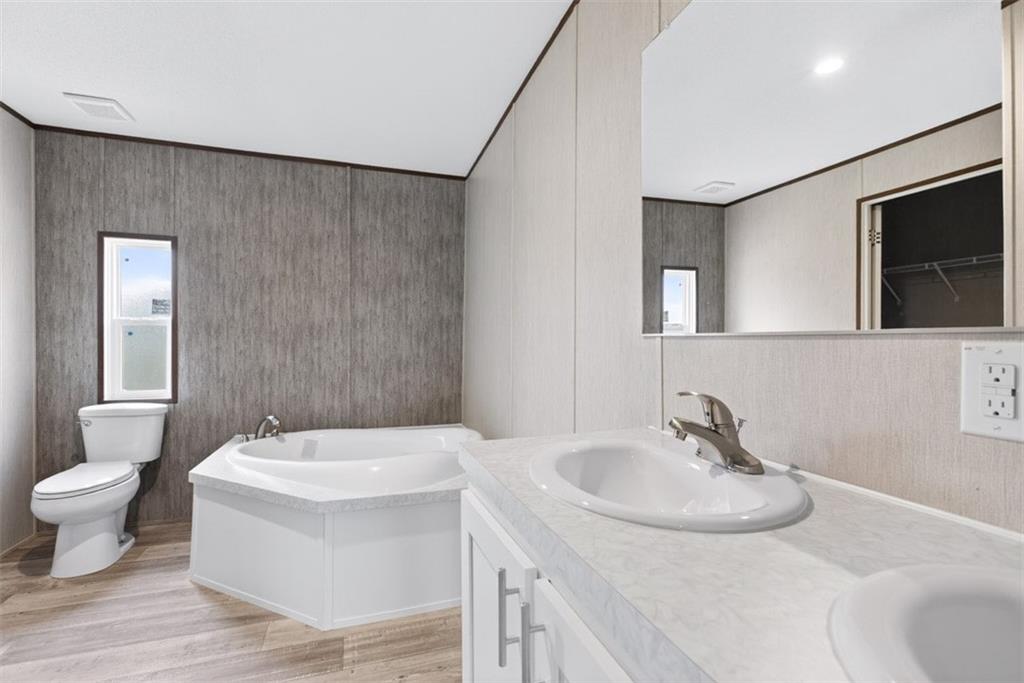 533 Pearwood Road Royston, GA 30662 - Photo 19 of 50 a bathroom with a sink and a mirror