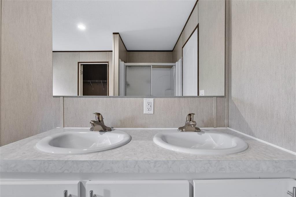 533 Pearwood Road Royston, GA 30662 - Photo 20 of 50 a bathroom with a sink and a mirror