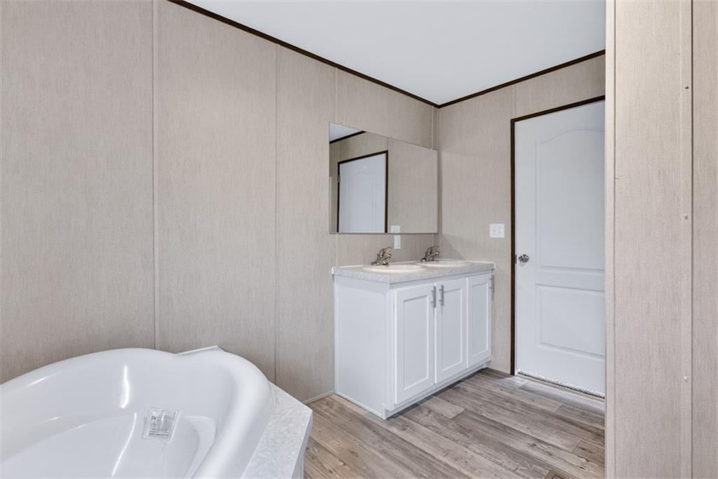 533 Pearwood Road Royston, GA 30662 - Photo 22 of 50 a bathroom with a sink and a mirror