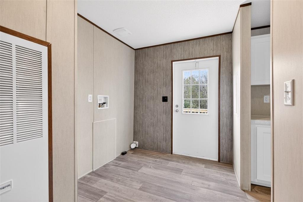 533 Pearwood Road Royston, GA 30662 - Photo 27 of 50 a big room with wooden floor and windows