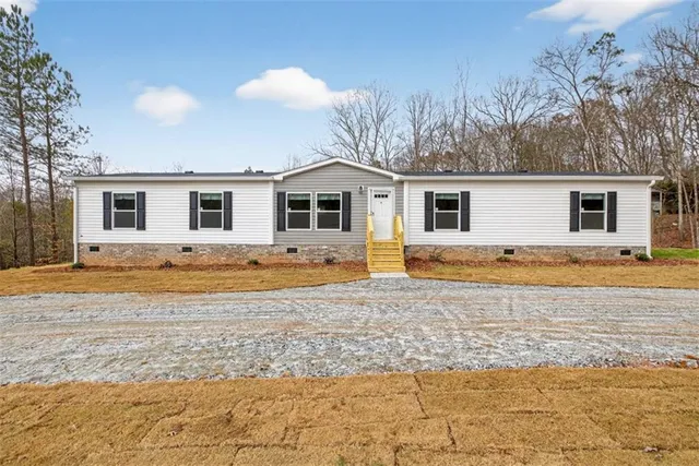 a view of a house with a swimming pool