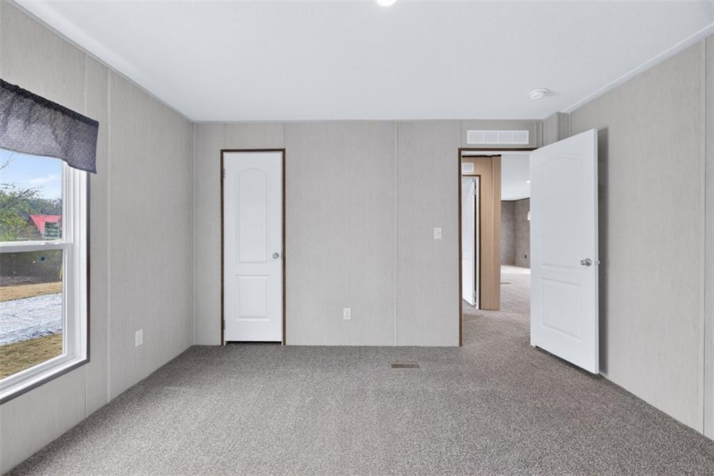 533 Pearwood Road Royston, GA 30662 - Photo 45 of 50 a view of an empty room with a window