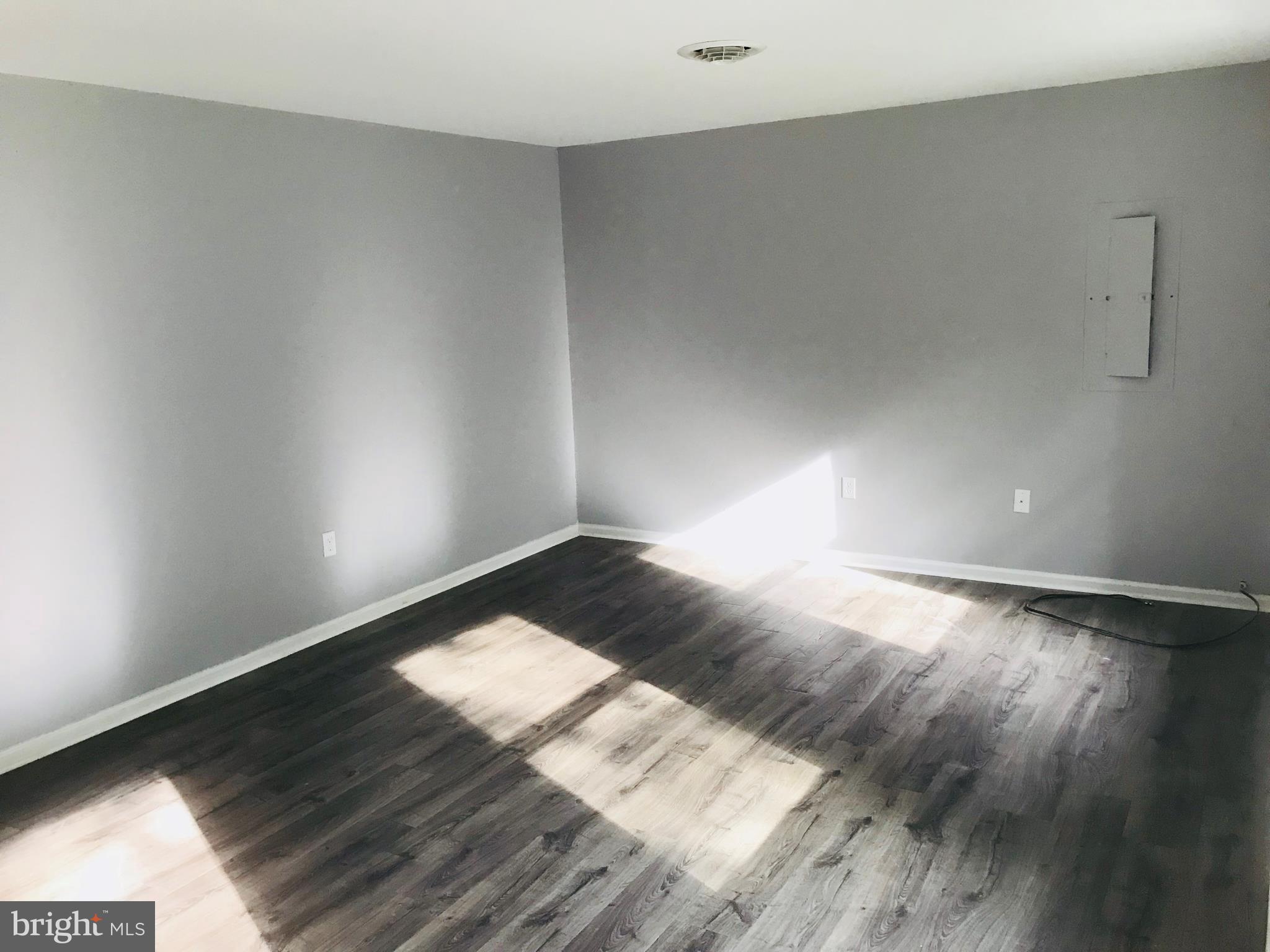 23412 Sandpiper Road Chestertown, MD 21620 - Photo 6 of 19 showing fresh paint and new pergo floors