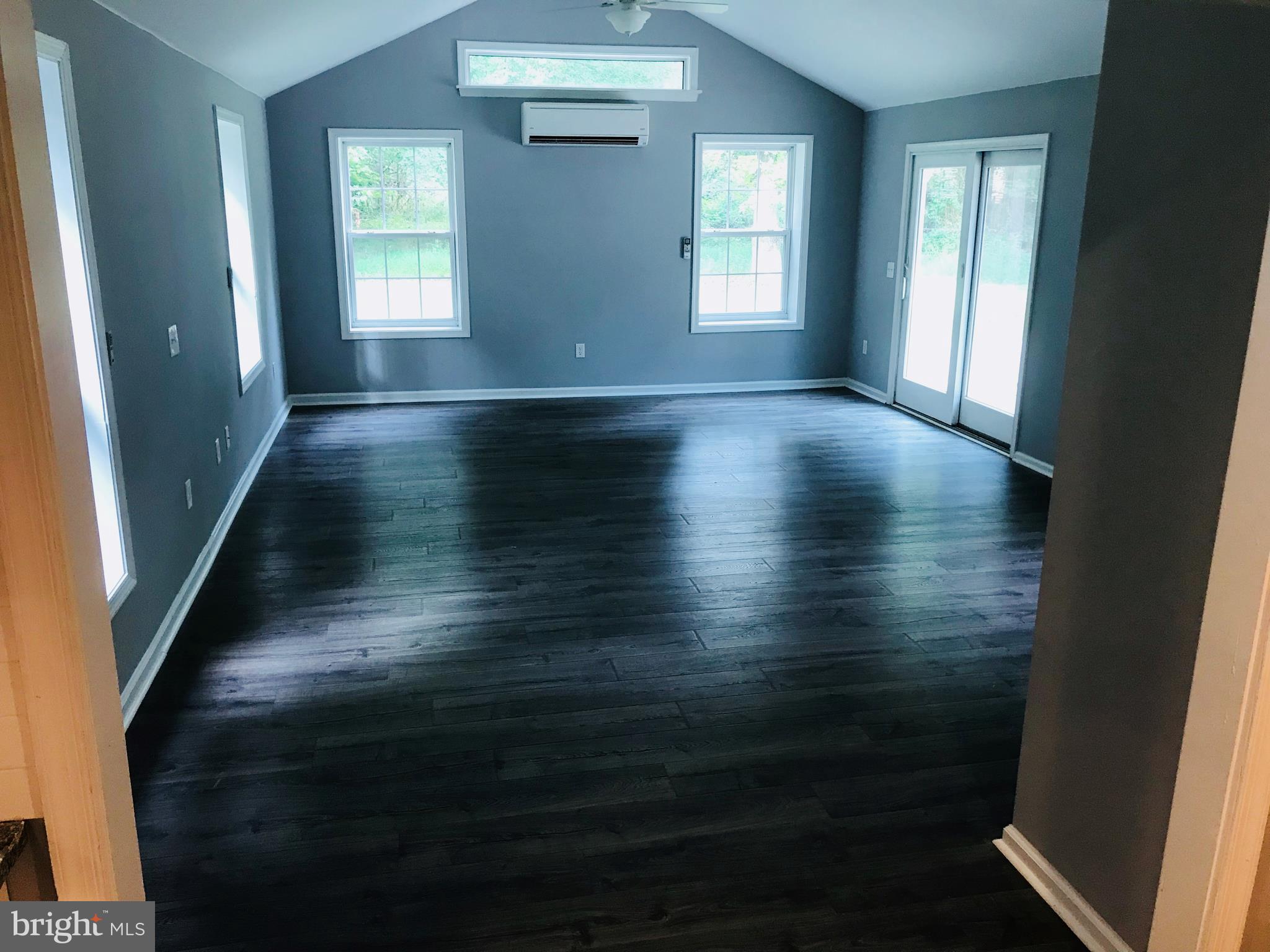 23412 Sandpiper Road Chestertown, MD 21620 - Photo 10 of 19 Huge great room with sliders out to deck