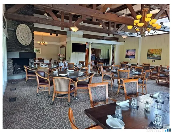 a group of people sitting in living room