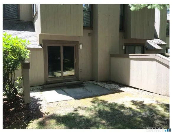 a house with yard in front of it