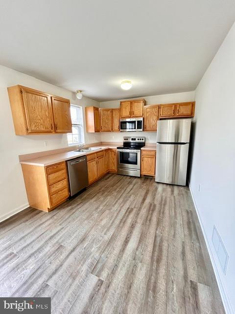 2005 Greystone Drive Lebanon, PA 17042 - Photo 5 of 35 a kitchen with a wooden floor and a window