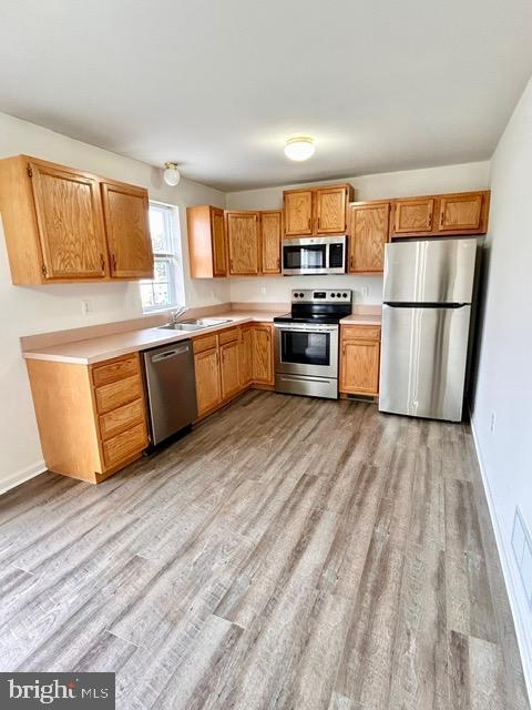 2005 Greystone Drive Lebanon, PA 17042 - Photo 6 of 35 a large kitchen with stainless steel appliances granite countertop a stove a sink dishwasher a refrigerator white cabinets and wooden floor