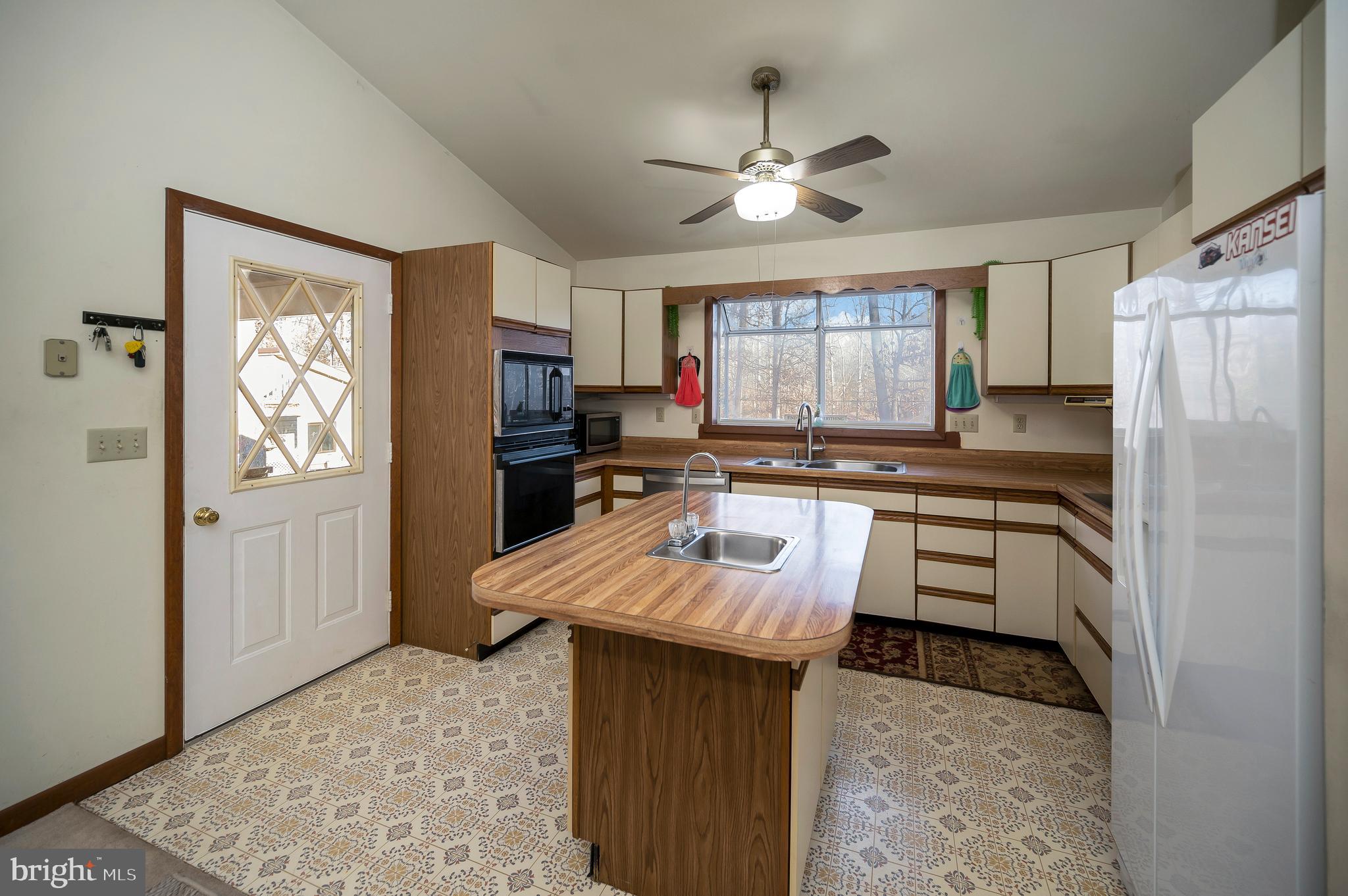 111 Birchside Circle Locust Grove, VA 22508 - Photo 11 of 61 Door leads to carport and extra storage
