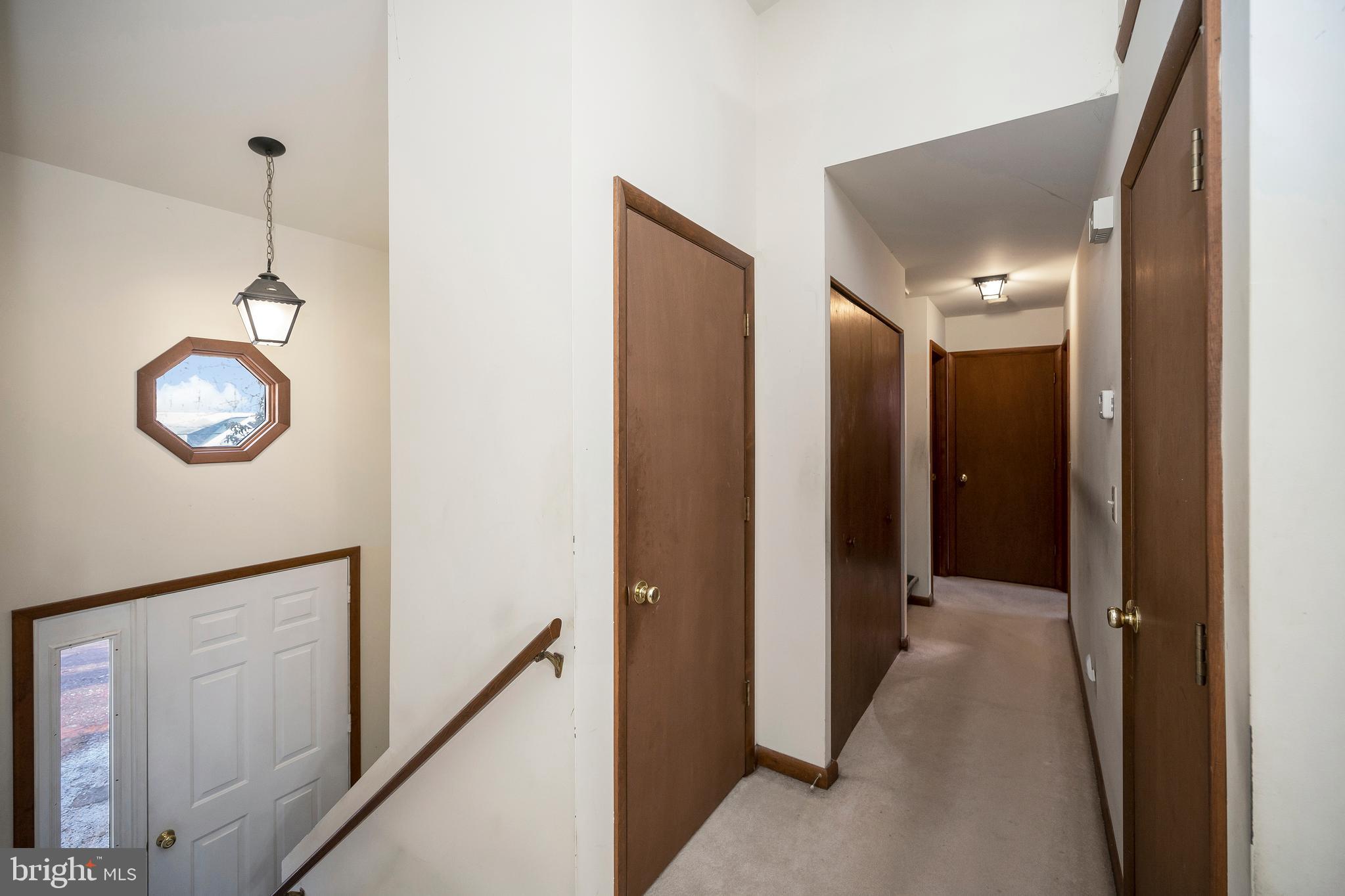 111 Birchside Circle Locust Grove, VA 22508 - Photo 17 of 61 Upper level laundry in hall