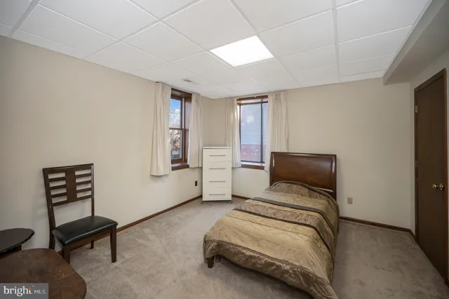 a bathroom with a sink a vanity and a mirror