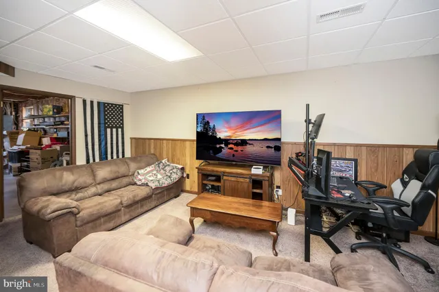 a view of a chairs on the roof deck