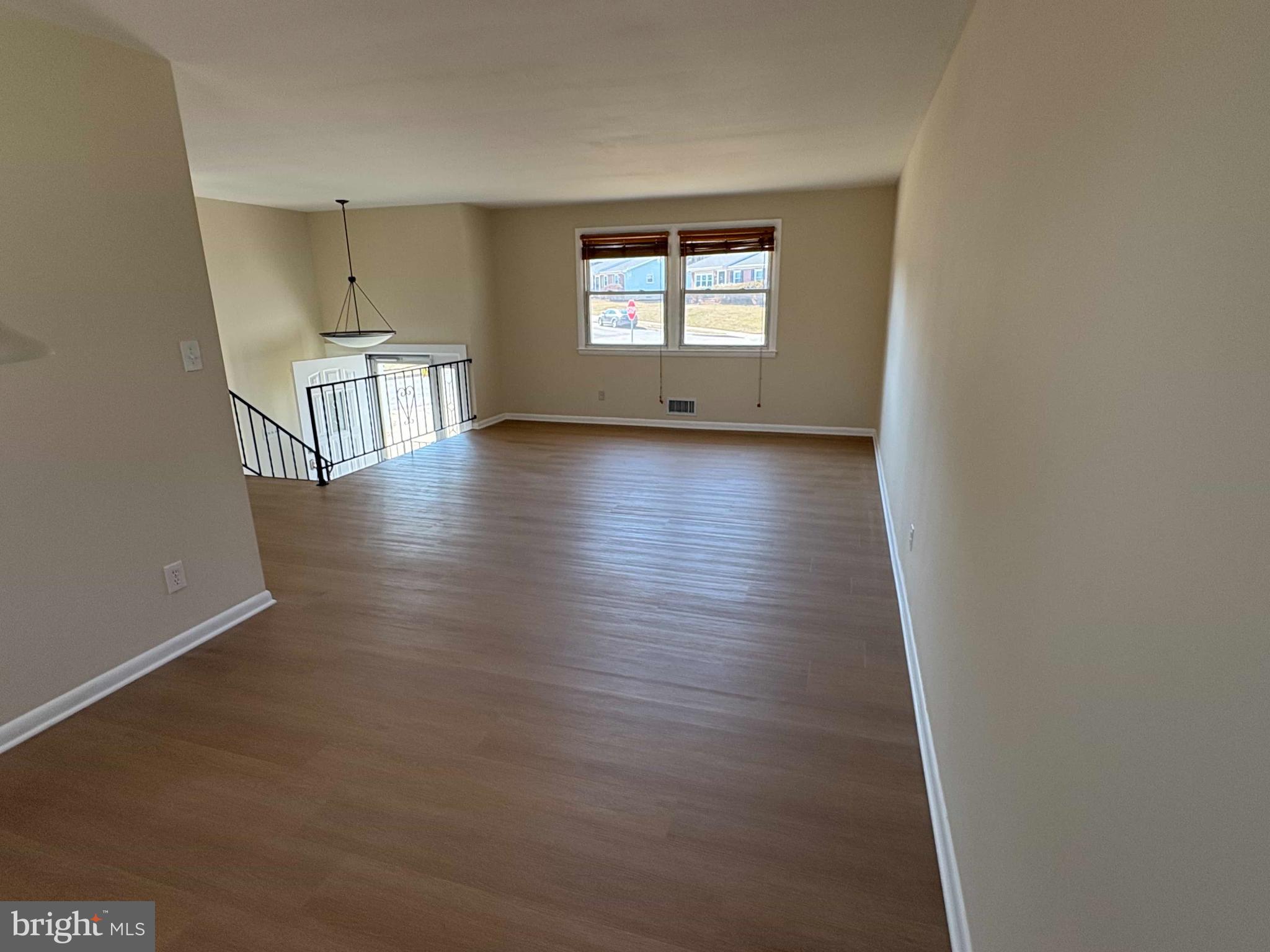 8716 Stephanie Road Randallstown, MD 21133 - Photo 11 of 19 Spacious, sunlit living area awaits your touch.