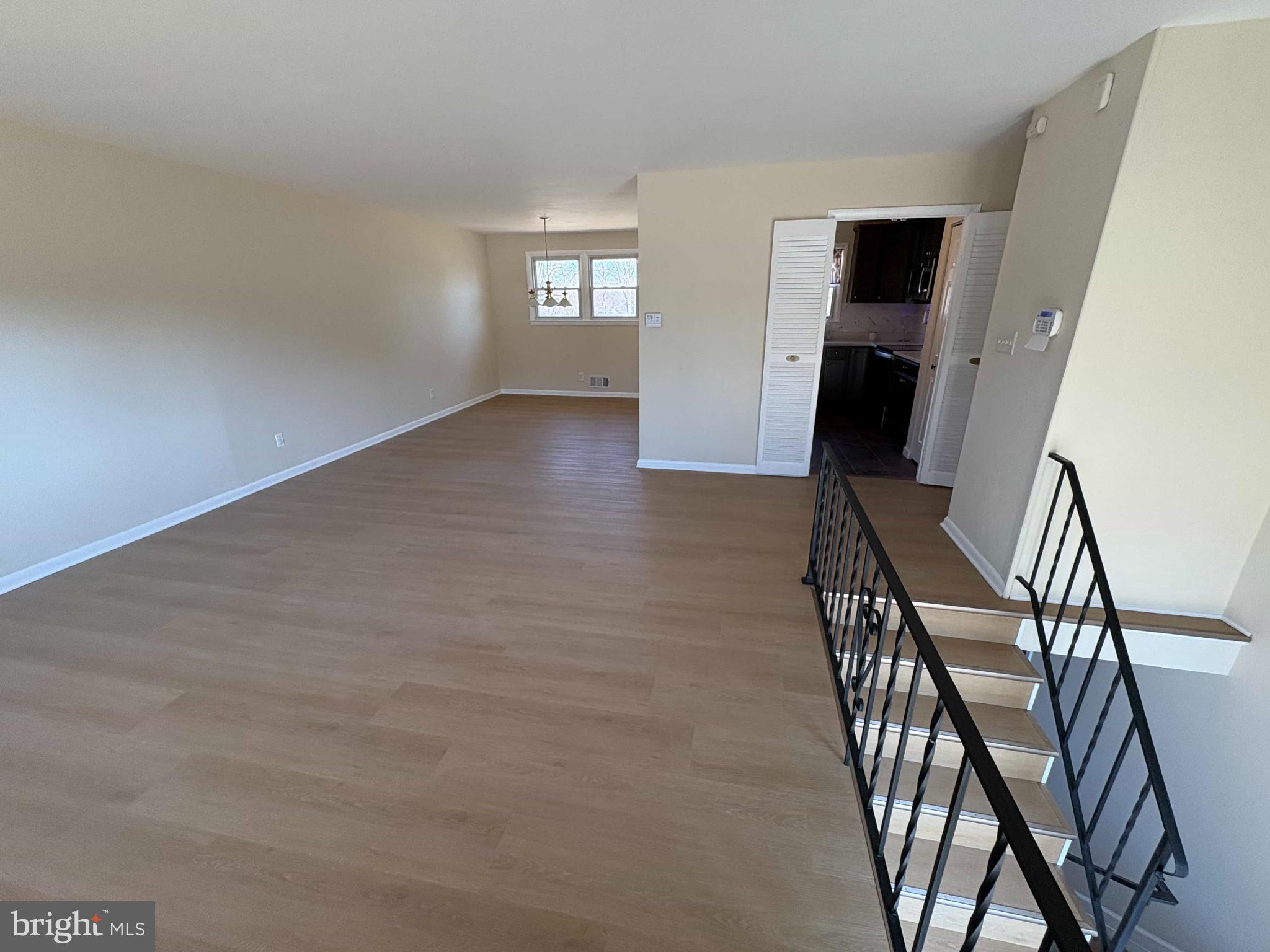 8716 Stephanie Road Randallstown, MD 21133 - Photo 12 of 19 Spacious, sunlit living area awaits your touch.
