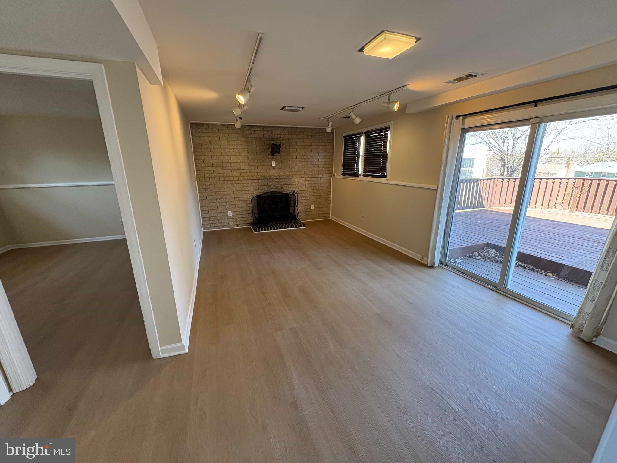 8716 Stephanie Road Randallstown, MD 21133 - Photo 14 of 19 Spacious living area with natural light.