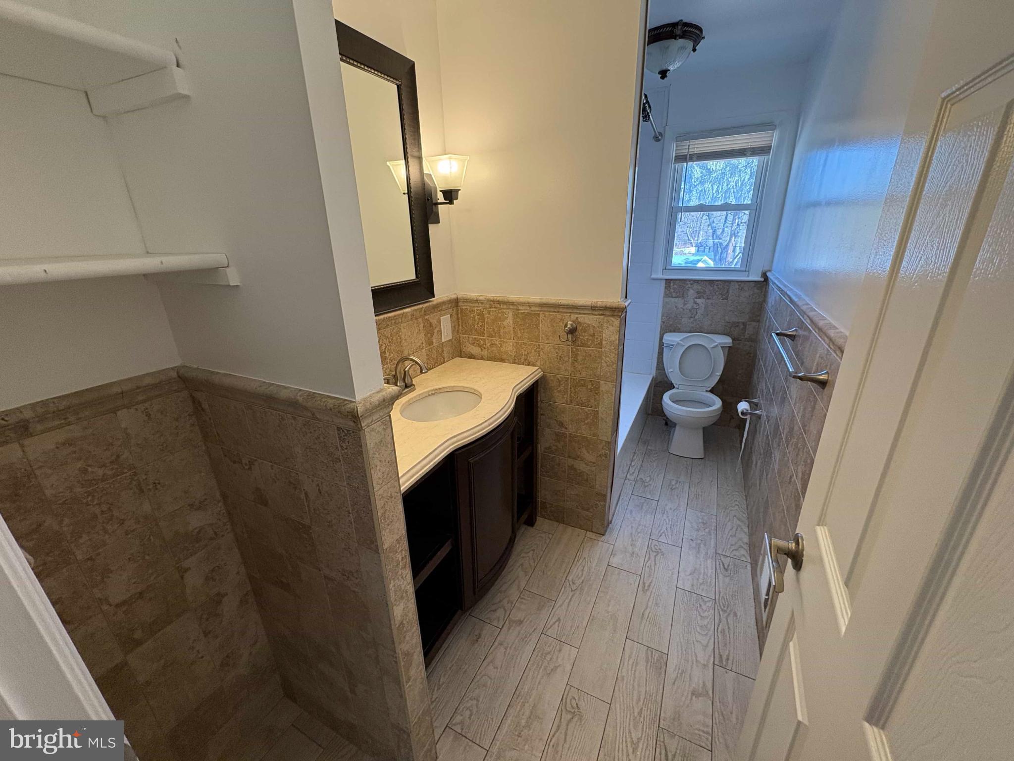 8716 Stephanie Road Randallstown, MD 21133 - Photo 18 of 19 Elegant bathroom with modern finishes.