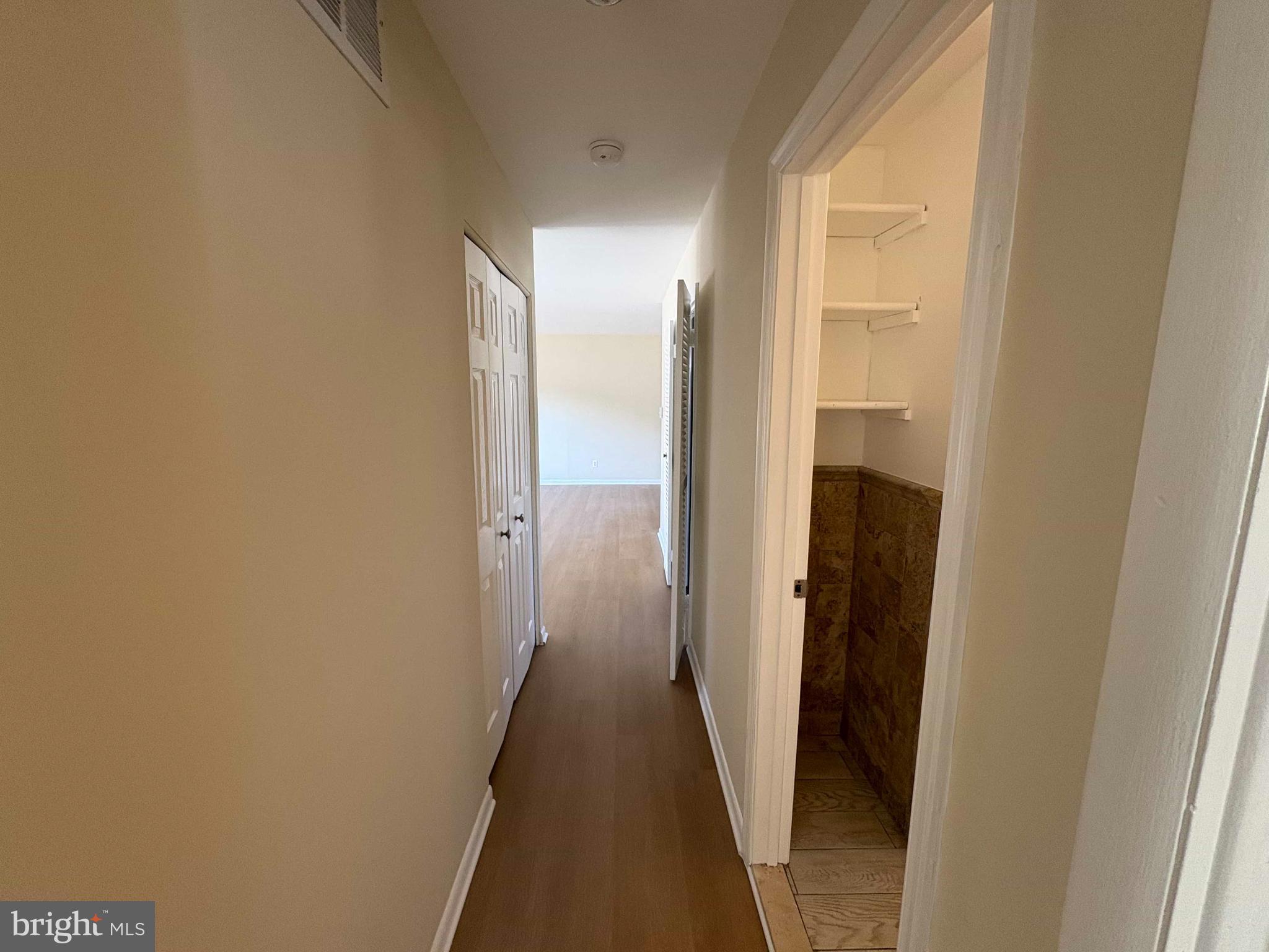 8716 Stephanie Road Randallstown, MD 21133 - Photo 10 of 19 Bright and inviting hallway with ample space.