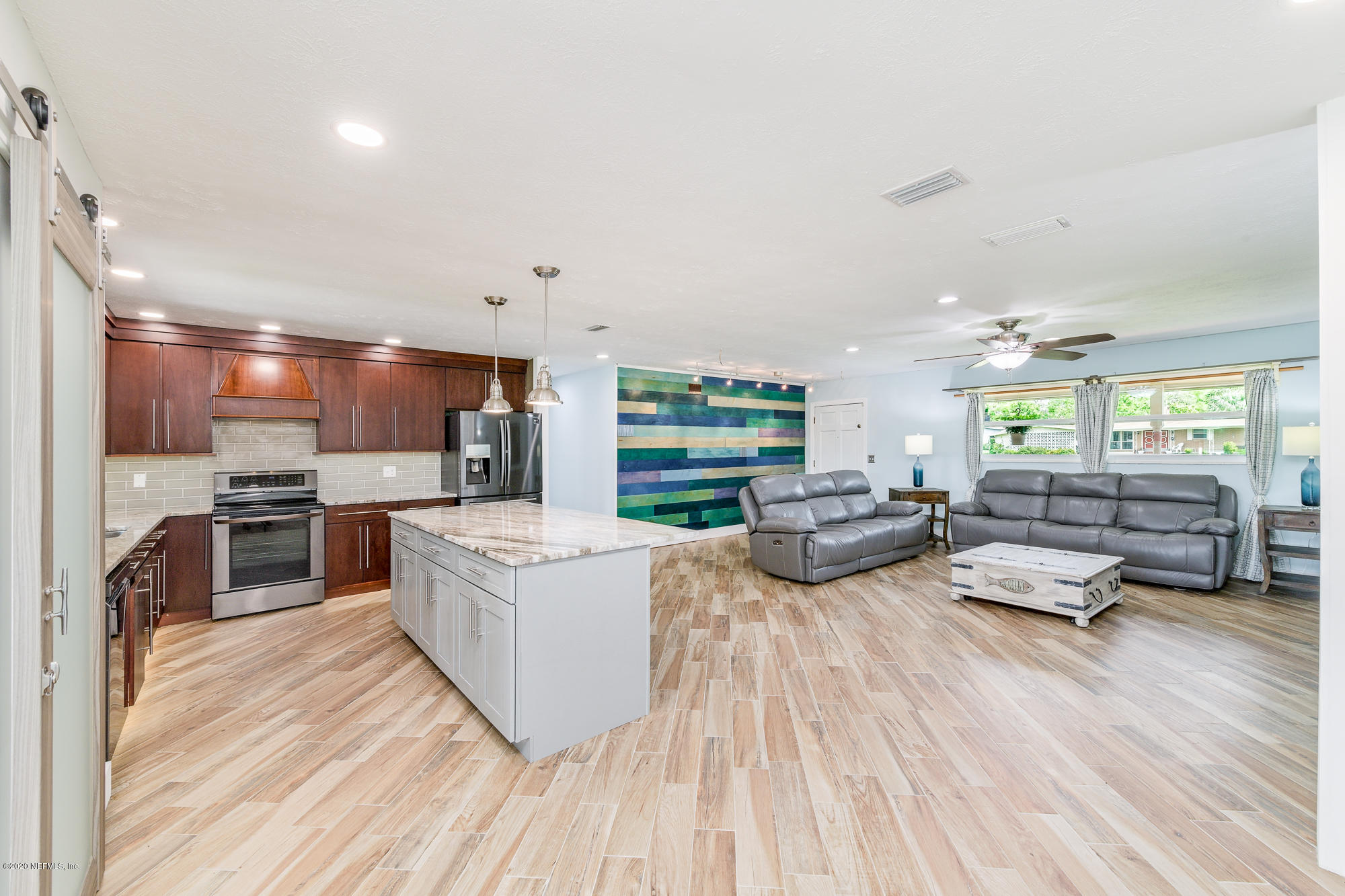 256 Baisden Road Jacksonville, FL 32218 - Photo 8 of 26 a living room with furniture and kitchen view