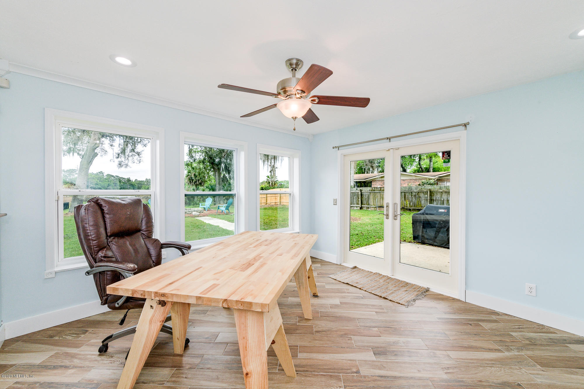 256 Baisden Road Jacksonville, FL 32218 - Photo 10 of 26 a workspace with wooden floor and windows