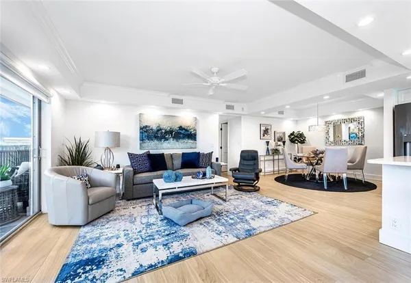 a living room with furniture or couch and a coffee table