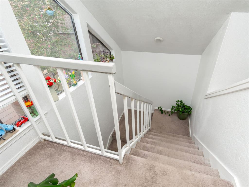 18240 Midway Road, Unit 205 Dallas, TX 75287 - Photo 21 of 27 a view of entryway with stairs