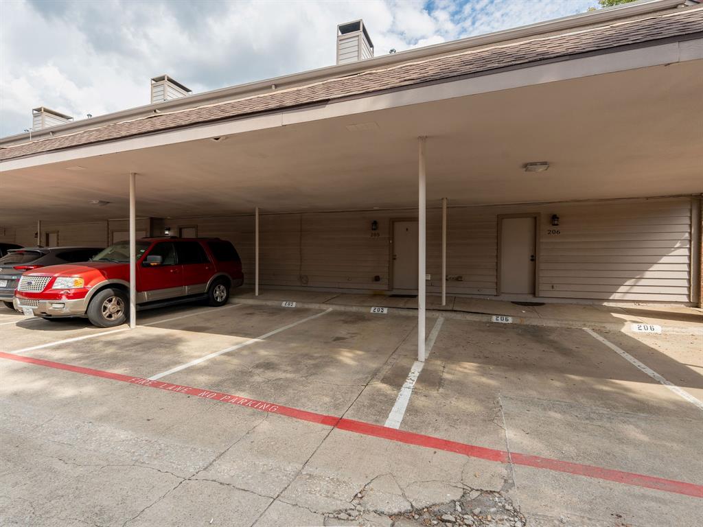 18240 Midway Road, Unit 205 Dallas, TX 75287 - Photo 24 of 27 a view of parking area