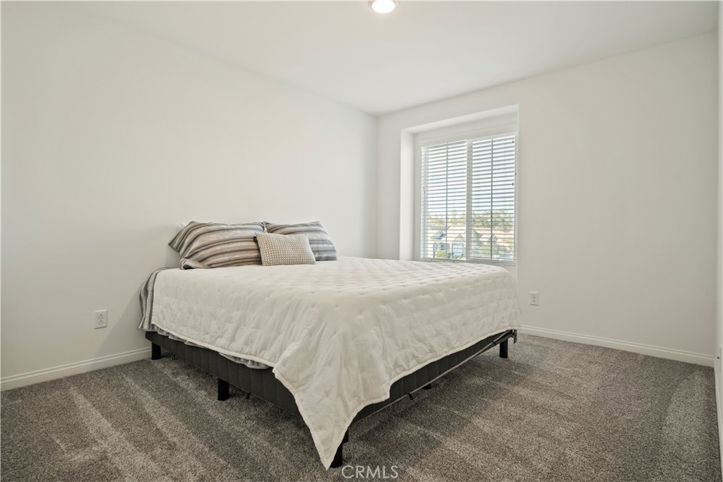 30295 Singer Lane Menifee, CA 92584 - Photo 26 of 52 Upstairs Bedroom