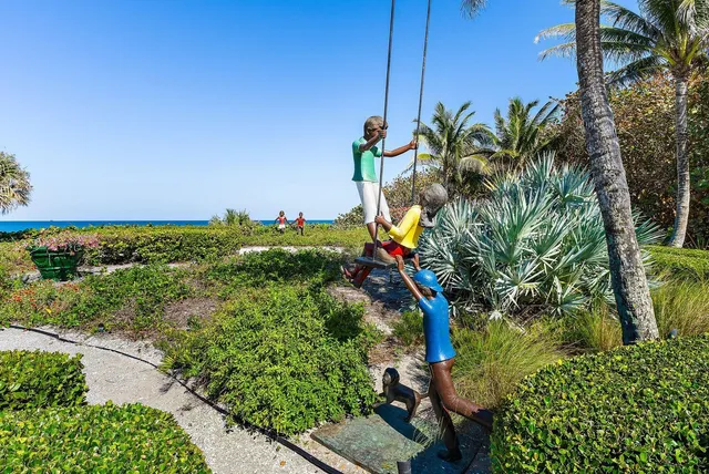 a kitchen with stainless steel appliances granite countertop a stove and cabinets