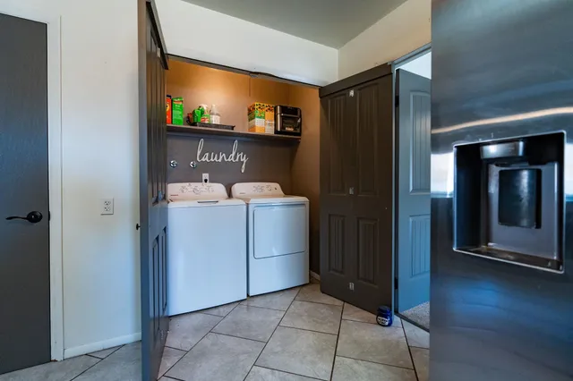 a room with a table and chairs