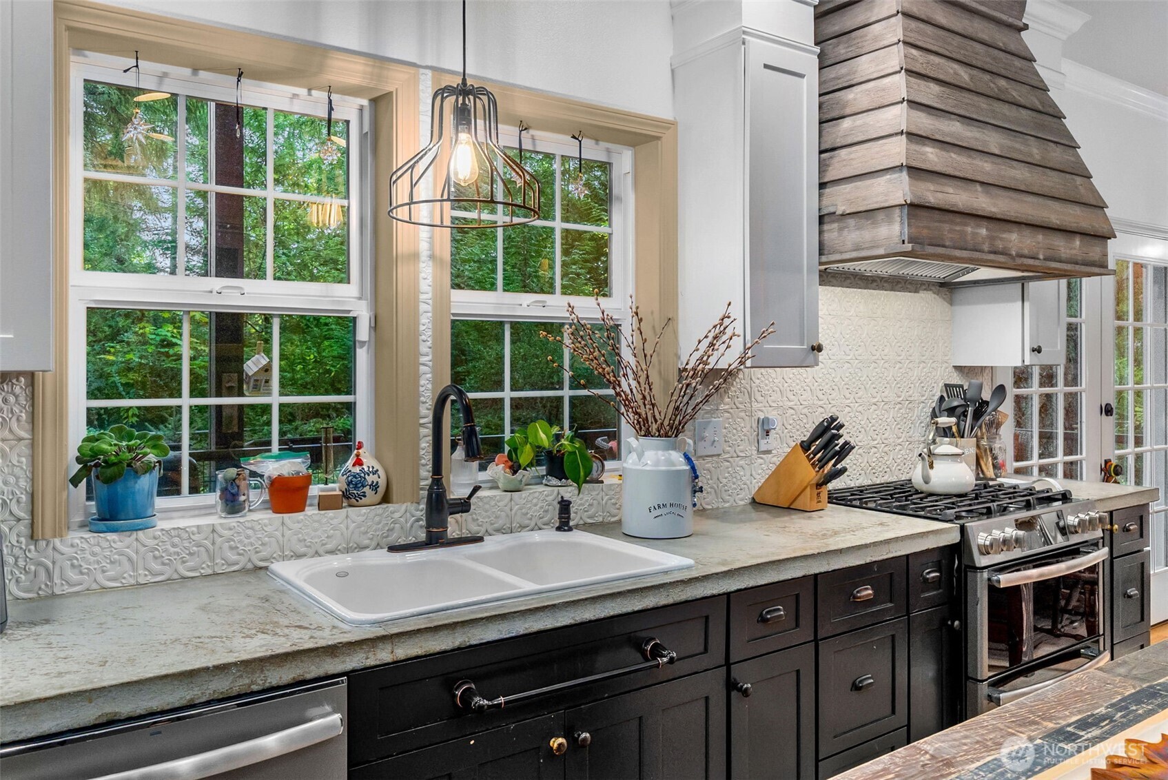 1130 East Sunset Hill Road Shelton, WA 98584 - Photo 18 of 40 a kitchen with a sink and a large window