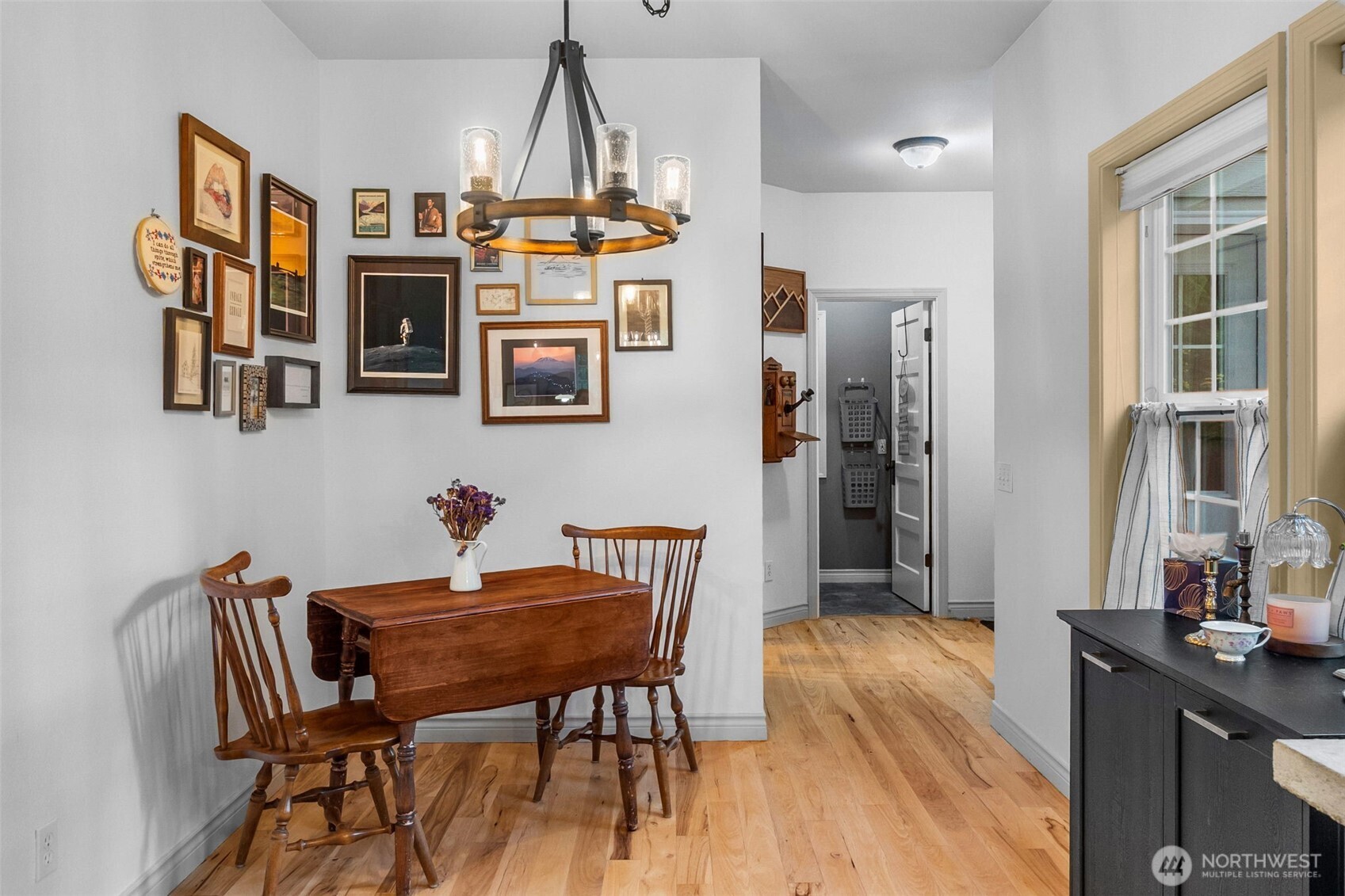 1130 East Sunset Hill Road Shelton, WA 98584 - Photo 22 of 40 a view of a dining room with furniture and wooden floor
