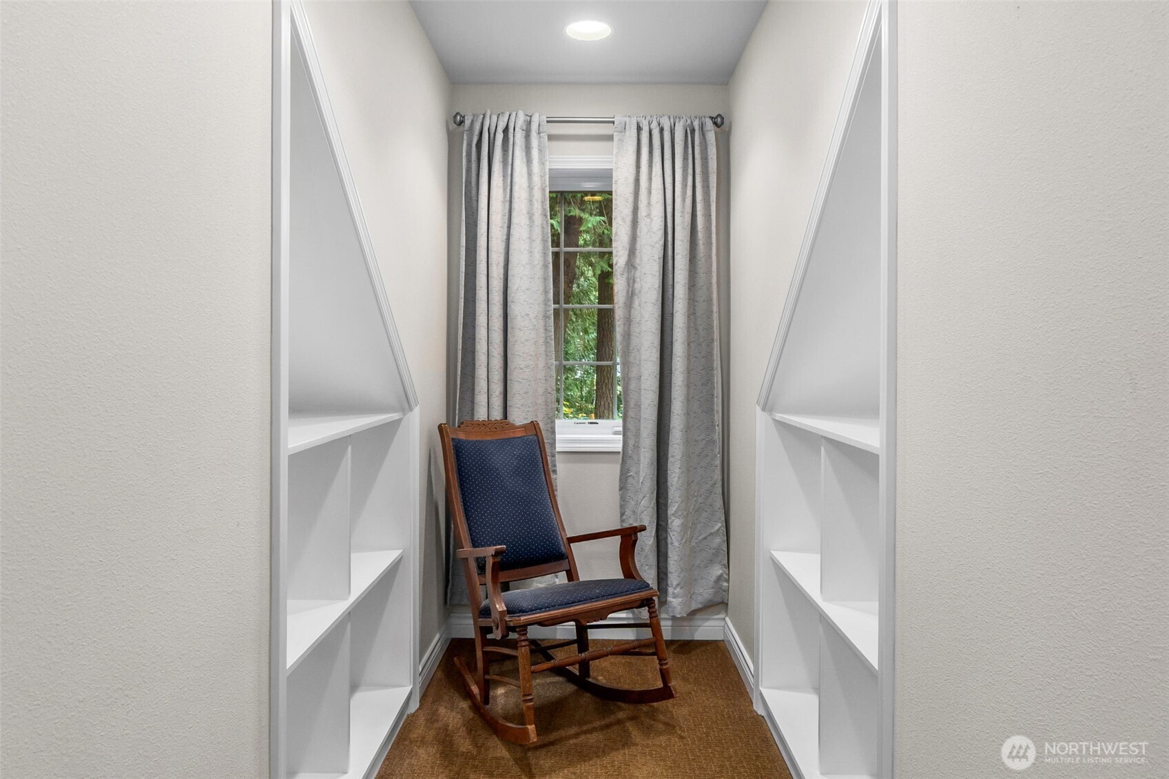 1130 East Sunset Hill Road Shelton, WA 98584 - Photo 30 of 40 a view of a workspace with furniture and a window