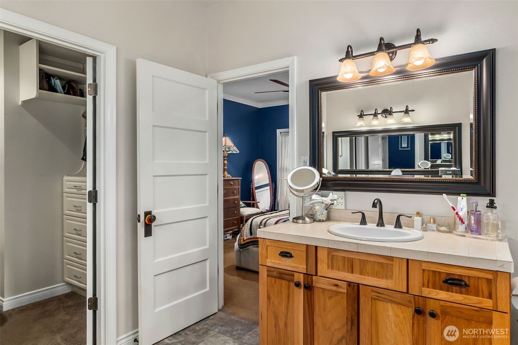 1130 East Sunset Hill Road Shelton, WA 98584 - Photo 7 of 40 a bathroom with a sink vanity and mirror