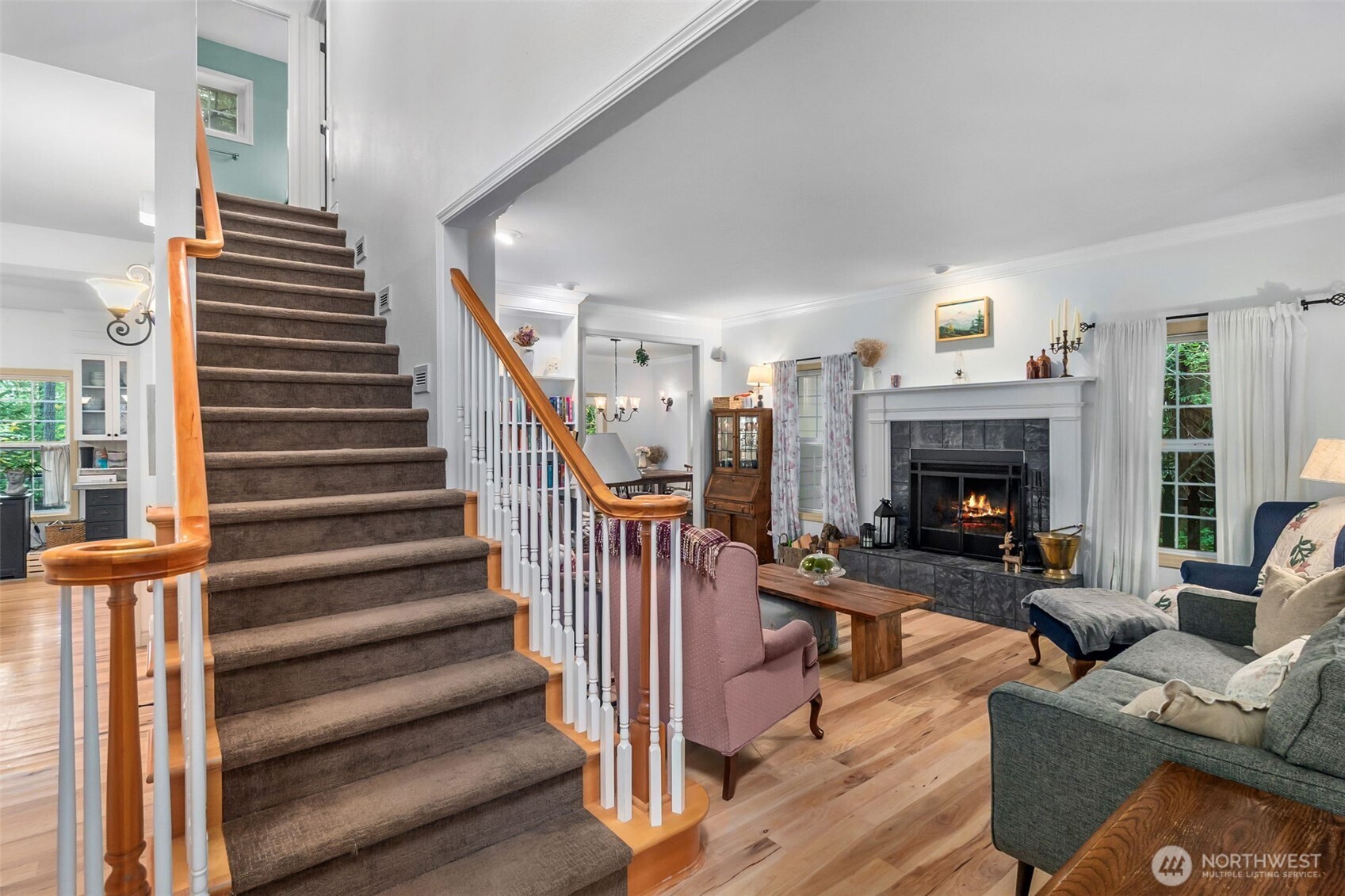 1130 East Sunset Hill Road Shelton, WA 98584 - Photo 9 of 40 a view of a livingroom with furniture and a fireplace
