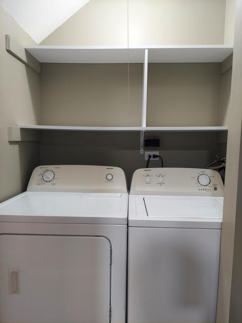 34W951 Stanton Drive, Unit G St. Charles, IL 60174 - Photo 8 of 11 a utility room with dryer and washer
