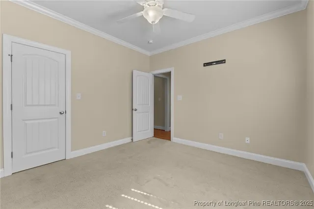 a bathroom with a granite countertop sink toilet and a mirror