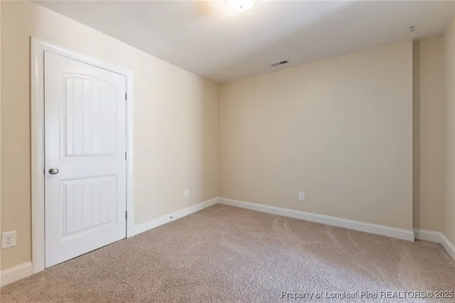 a bathroom with a sink double vanity granite tub shower and a mirror