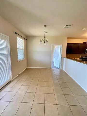 a view of a livingroom with furniture