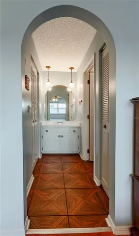 a room with a mirror and a shower