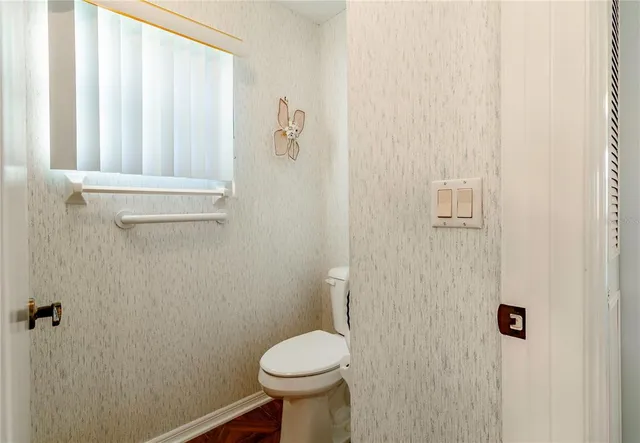 a bathroom with a sink and toilet