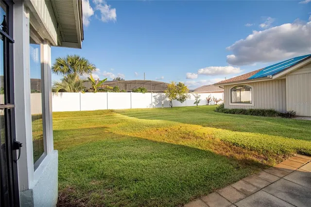 a view of a house with a big yard